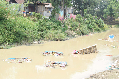 Immersion ghats in Agartala on March 30 remain uncleaned after immersion of Goddess Basanti.