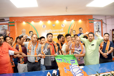BJP leaders welcome new comers in the party during a press conference at state headquarters in Agartala on March 10.