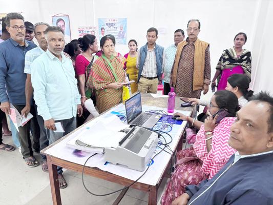 Agartala Municipal Corporation (AMC) employees collect property tax in an AMC Office at Agartala on February during a special tax collection camp.