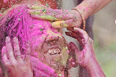 During the celebration of ‘Dol Purnima’ and Holi, girls smeared faces of each other with multiple colours in Agartala on March 2.