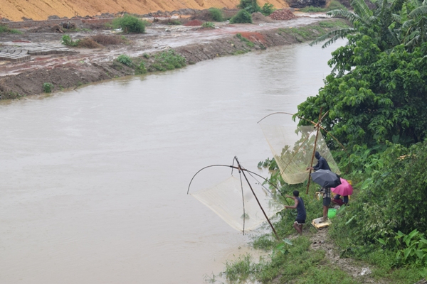 The water level of the Howrah River rises following heavy rainfall across Agartala on May 27.