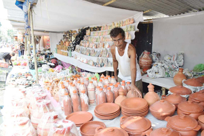 Devotees gather as the Ambubachi Mela gets underway in front of the Laxmi Narayan Bari Temple in Agartala on June 22.