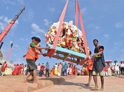 Idol immersion process begins on the auspicious occasion of Vijoya Dashami at the bank of river Hoara in Dashamighat area of Agartala.