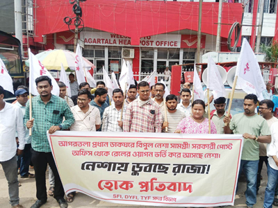 Youth wing activists of Left parties stage a protest in front of the Agartala Head Post Office on June 19.