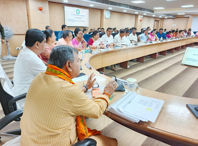 Officials attend a joint meeting between the Power Department and Agartala Municipal Corporation at the AMC conference hall in Agartala on August 17.