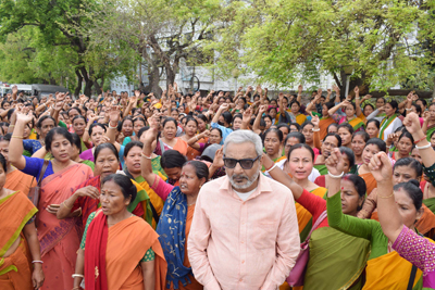 Senior Advocate Puroshattam Roy Barman leads a protest of Anganwadi workers in front of Swami Vivekananda Maidan in Agartala on March 21.