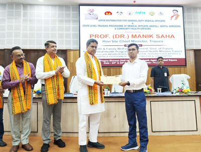 Tripura Chief Minister Dr. Manik Saha distributes offer letters to General Duty Medical Officers at Pragna Bhavan in Agartala on August 25.