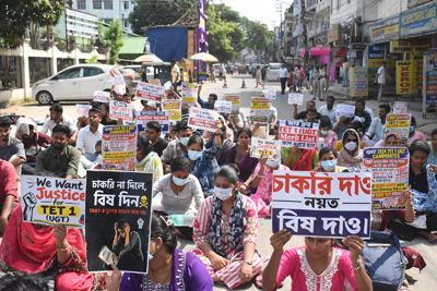 TET paper-I qualifiers continue their protest in front of Siksha Bhavan in Agartala on October 16.