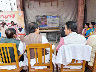 Mayor of Agartala Municipal Corporation (AMC) Dipak Majumder listens to the Union Budget at Durga Chowmuhani Bazar on February 1st.