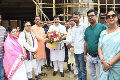 BJP MP Kanad Purakayastha visits the under construction multi-layer parking complex at Old Motor Stand area of Agartala with party leaders and workers on June 11.