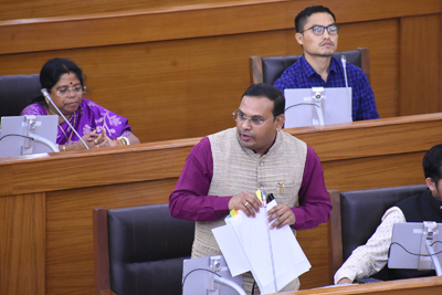 Higher Education Minister Kishor Barman addresses the state assembly on March 20.