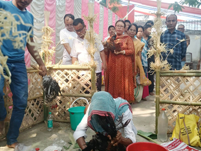 A tribal priest offering puja in front "God Garia", one of the biggest annual religious festivals mainly of the tribals of Tripura, observed on April 21 in Agartala.
