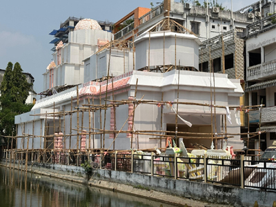 Volunteers give the final touches to the Durga Puja pandal of Shantipara Yakatan Juba Sanstha in Agartala ahead of the festival on October 3. 