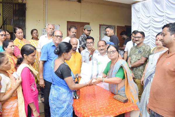 Lalbahadur Club of Agartala distributes packaged food ration among the poor on September 20.