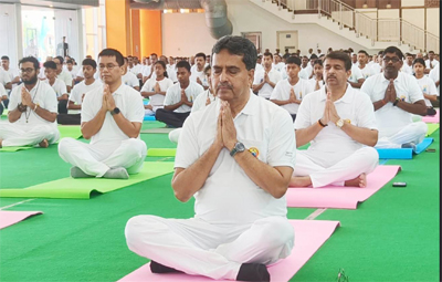 Chief Minister Dr Manik Saha attends International Yoga Day celebration at Hapania International Fair Ground in Agartala on June 21.