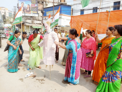 Activists of the Mahila Congress stage a protest and burn an effigy of Union Home Minister Amit Shah in Agartala on February 26.