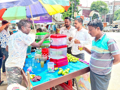 Street vendors selling fresh lemon juice in Agartala to help residents beat the summer heat on June 2. 