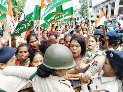 A scuffle breaks out between Mahila Congress workers and police in Agartala on June 19 during a protest against rising crime against women.