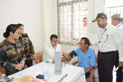DM of West Tripura district Dr Vishal Kumar interacts with patients at a health camp organised by the Ex-Servicemen Welfare Society to mark its foundation day on May 26.