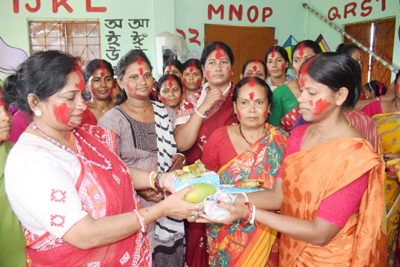 Women apply vermilion on each other to mark the auspicious occasion of Ambubachi festival at ward number 14 Agartala on June 25.