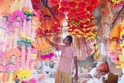 Different types of garlands are being prepared in factories ahead of the Puja season in Agartala on September 23.