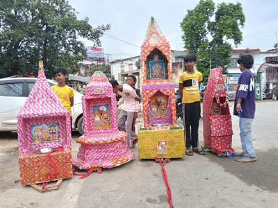 Small boys pull the Chariot of Lord Jagannath in a street of Agartala on July 16 during the celebration of the festival of ‘Rath Yatra’. Tripura along with other parts of the country celebrated the festival of ‘Rath Yatra’ with enthusiasm and religious fervor.