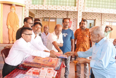 Members of Kourabs Club, Agartala, organise a clothes distribution drive in Agartala on October 13.