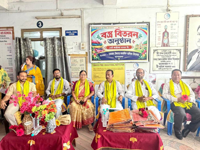 MP Rajib Bhattacharjee distributes clothes during a programme organised by Bodhjung HS Girls School in Agartala on October 12.