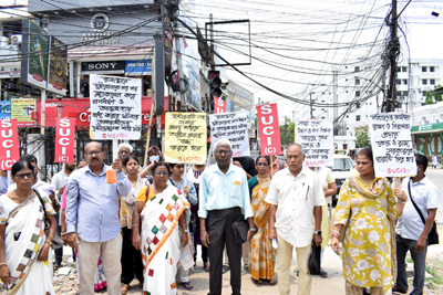 SUCI organized a protest in Agartala on May 20 against growing crime against women.