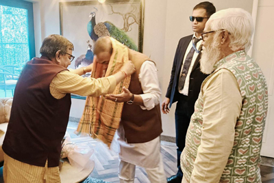 Power Minister Ratan Lal Nath meets Assam CM Himanta Biswa Sarma at a private hotel in Agartala on January 16.