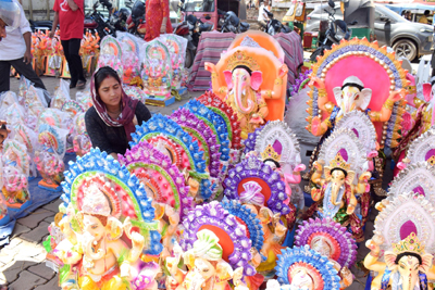 Idols of Lord Ganesh being taken to households by devotees ahead of Ganesh Chaturthi festival on September 14.