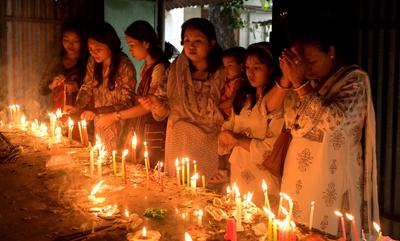 People offer prayers on the occasion of Buddha Purnima at Venuvan Buddha Vihara in Agartala on May 1.